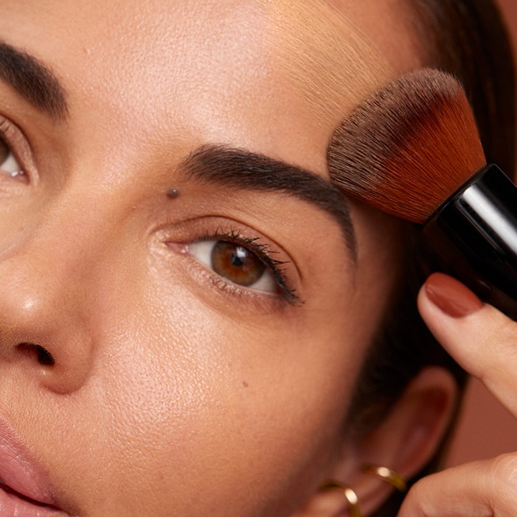 Close up of Bronzer with powder background