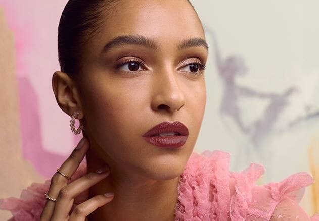 Model with holiday cocktail makeup look